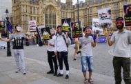 Activists stage anti-Saudi protest in London as Qatari emir arrives for talks